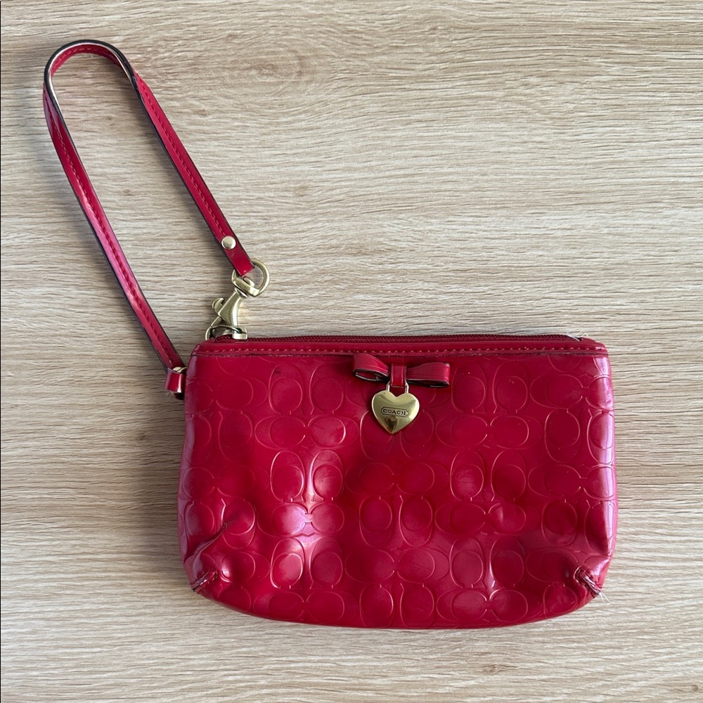 Coach Red Embossed Wristlet with Heart Charm